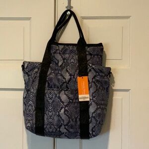 Haute Shore Jaime Puffer Tote with Wristlet bag